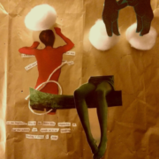 Collage with two dancing bears on cotton balls, a disembodied pair of legs are in the foreground, with a person facing away behind them
