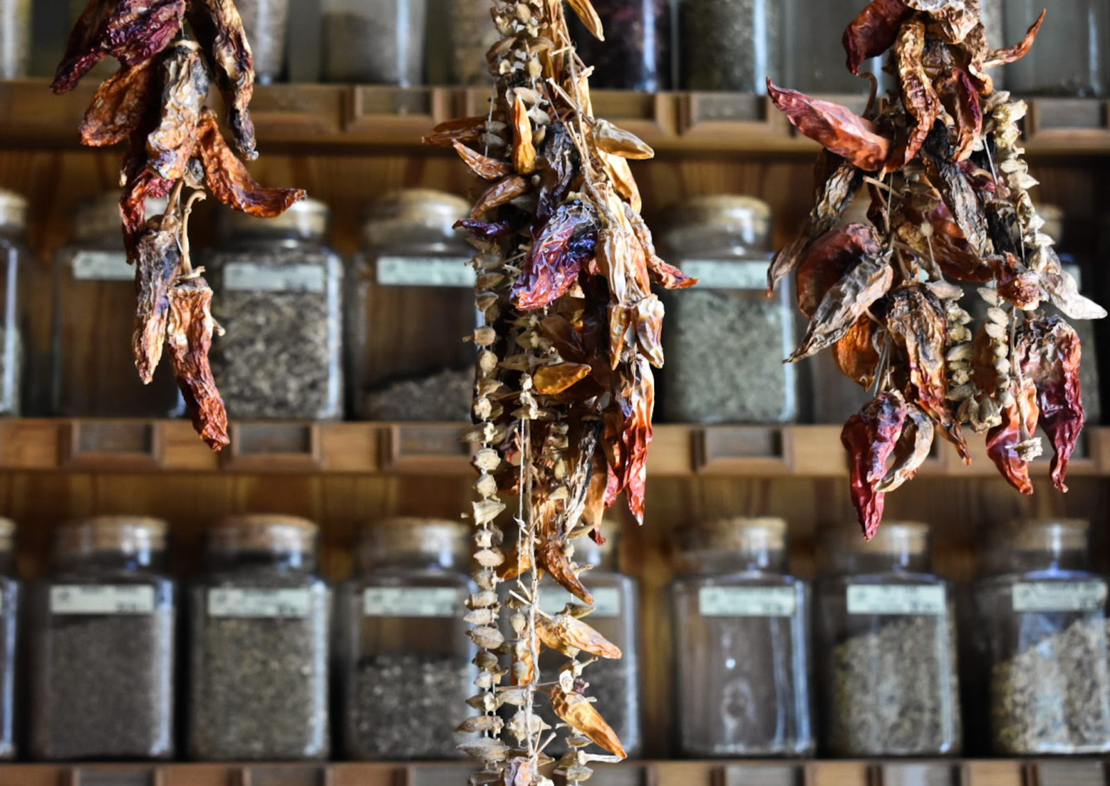 Hanging dried chilis in an apothecary