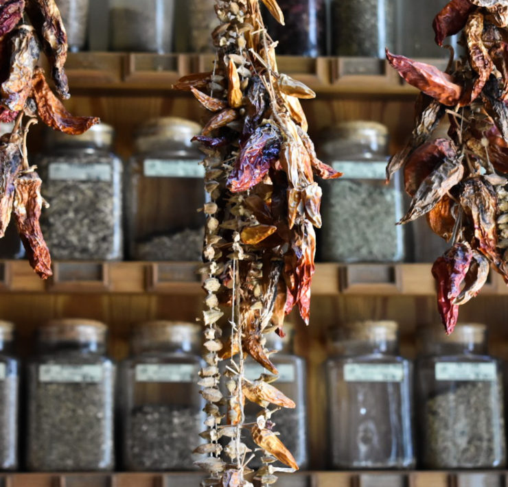 Hanging dried chilis in an apothecary