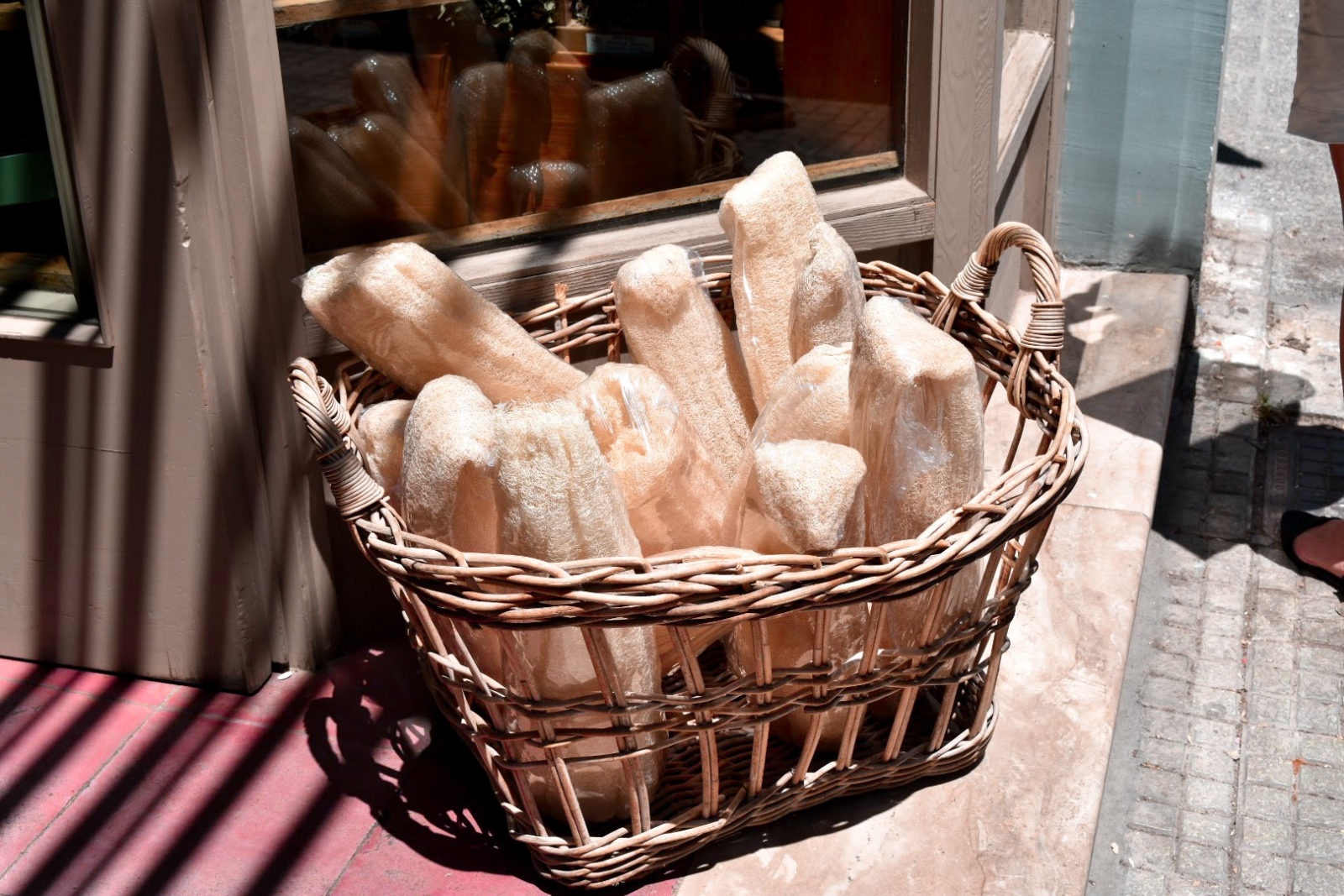 A basket of loofa sponges