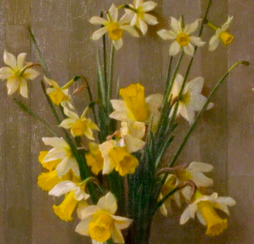 Bouquet of daffodils on a wooden background