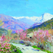 Painting of a valley with a small house surrounded by pink blossoming trees. A snowy mountain range can be seen in the distance