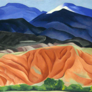 Landscape painting of mountains in a gradient of colors ranging from green, red, to blue