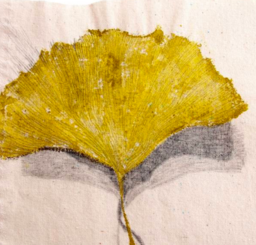Painting of a single yellow gingko leaf