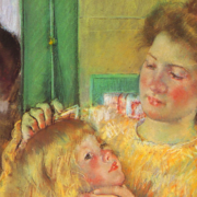 Impressionist painting of a woman in a yellow dress combing the hair of a child seated in her lap