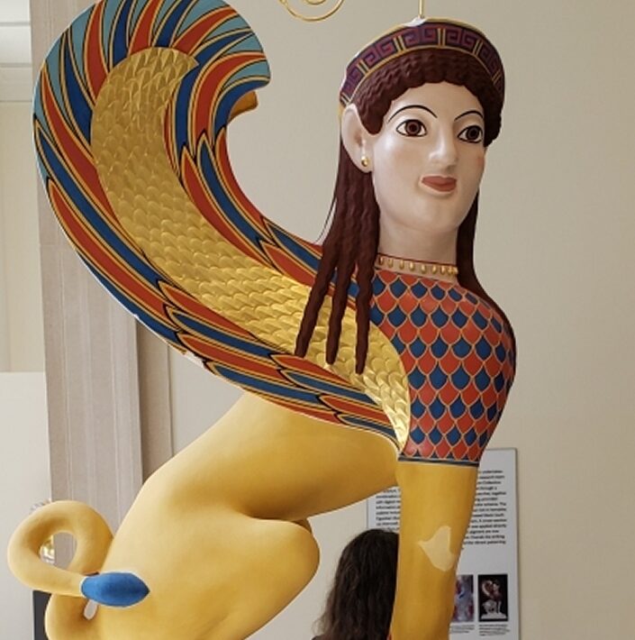 Colorful statue of a Greek sphinx