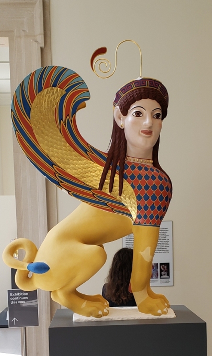 Colorful statue of a Greek sphinx