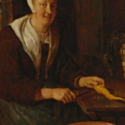 A Kitchenmaid Preparing Carrots