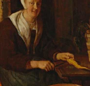 A Kitchenmaid Preparing Carrots