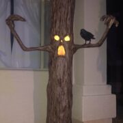 Haunted tree Halloween prop with glowing mouth and eyes